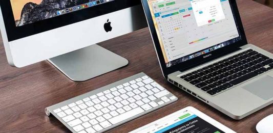 7 Common UX Mistakes and How to Avoid Them Frustrated user facing poor website UX design on laptop