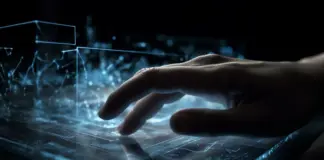 AI Impact on UX Design AI-generated futuristic glowing computer with person typing, symbolizing the impact of artificial intelligence on UX design