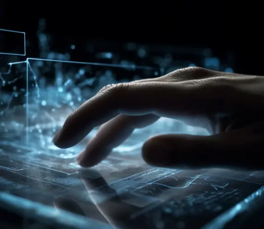 AI Impact on UX Design AI-generated futuristic glowing computer with person typing, symbolizing the impact of artificial intelligence on UX design