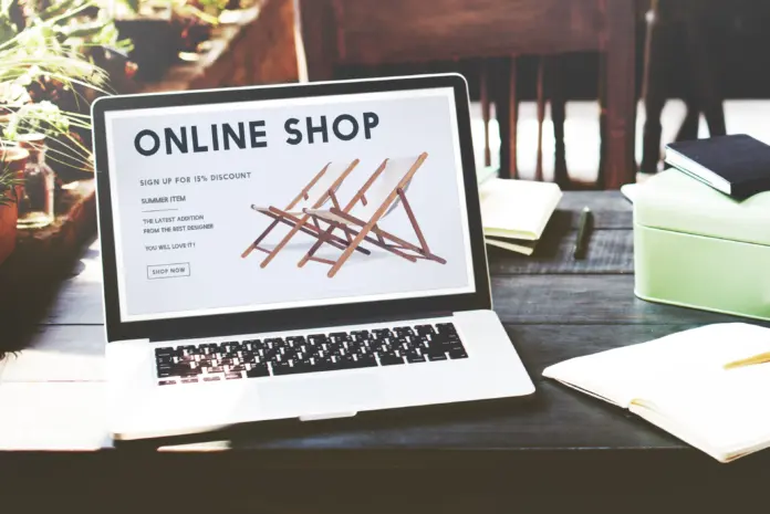 Online Shopping Experience - E-commerce and UX Design for Shopaholics Online shopping experience with e-commerce concept for shopaholics, showcasing digital shopping on a laptop with shopping carts and products.