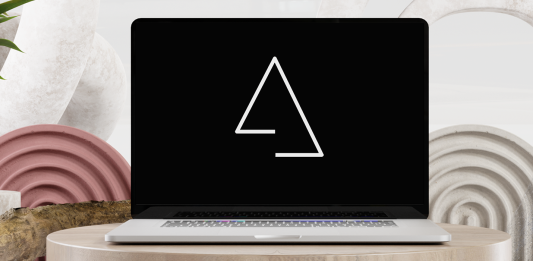 Aluxion digital product agency team collaborating on a design project in their Madrid office.